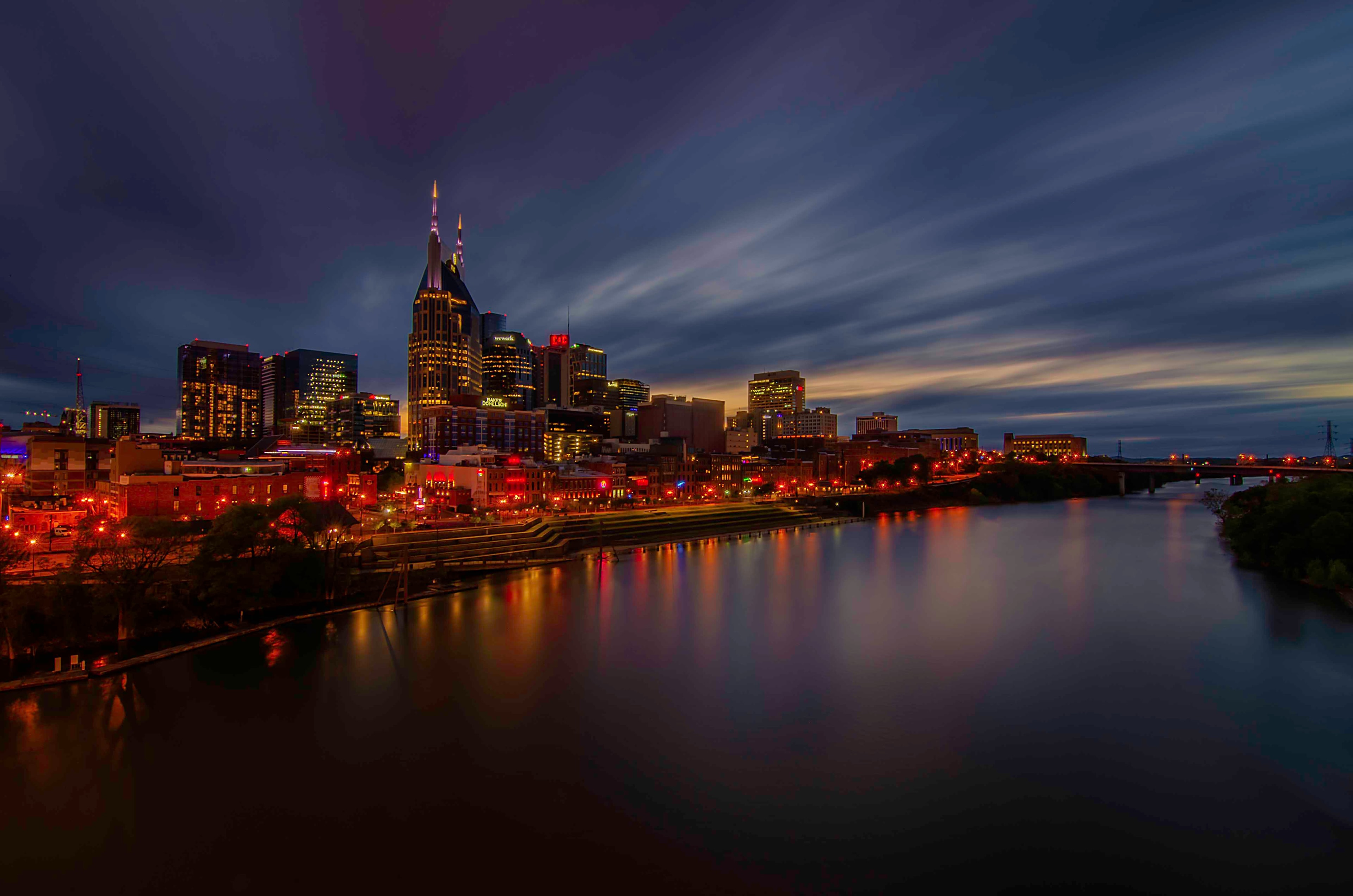 Nashville skyline at twilight reflected in the Cumberland River